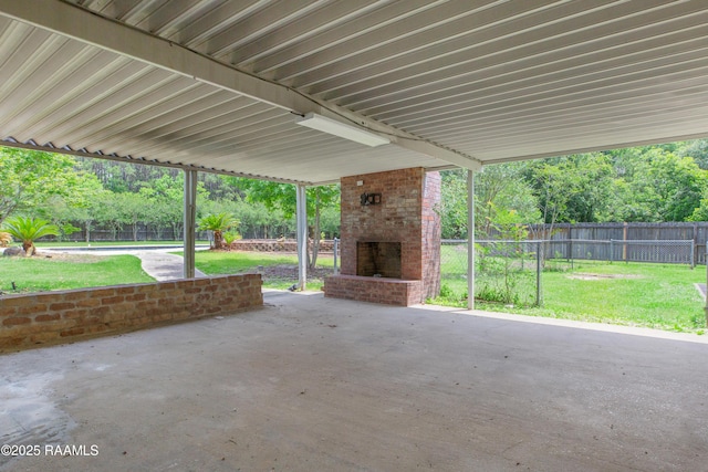 5811 Basile Eunice Hwy, Eunice, LA 70535 - view of patio / terrace featuring an outdoor brick fireplace