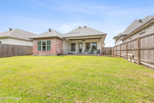 213 Octavia Dr, Scott, LA 70583 - back of house featuring ceiling fan, brick siding, a shingled roof, and a patio