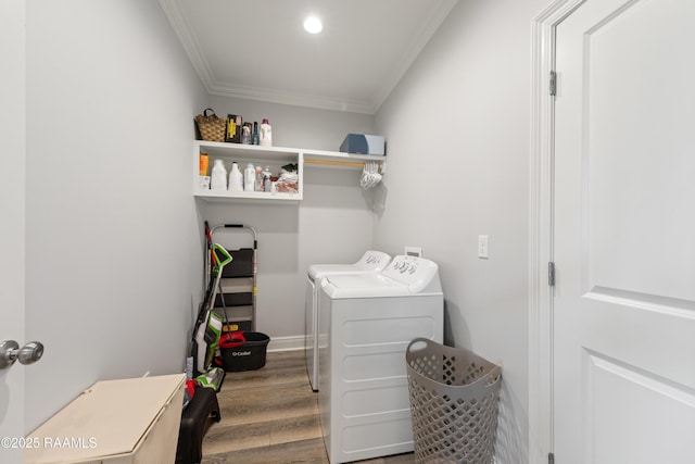213 Octavia Dr, Scott, LA 70583 - washroom featuring ornamental molding, washing machine and dryer, and wood finished floors