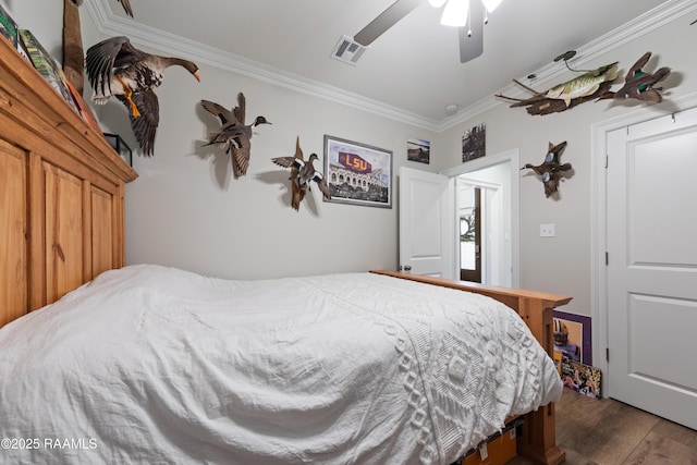 213 Octavia Dr, Scott, LA 70583 - bedroom featuring crown molding, wood finished floors, and ceiling fan