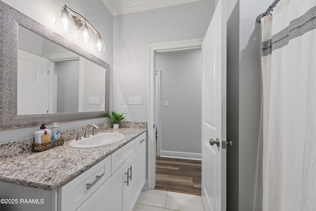 213 Octavia Dr, Scott, LA 70583 - bathroom with vanity, ornamental molding, and tile patterned flooring