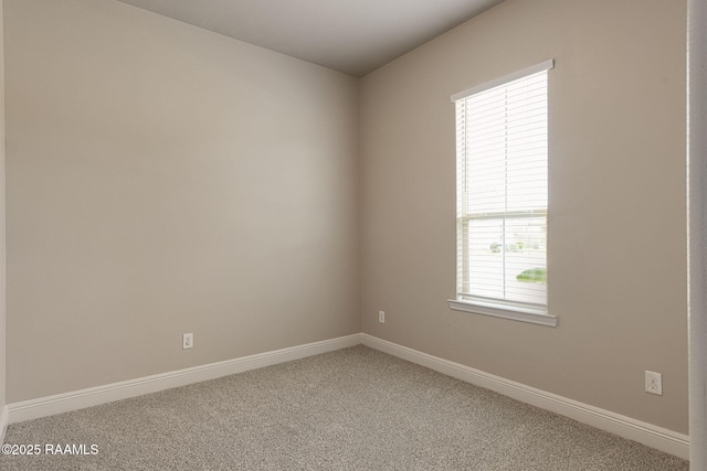 127 Laurel Grove Blvd, Youngsville, LA 70592 - spare room featuring carpet flooring and baseboards