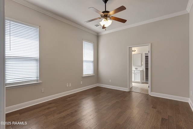 127 Laurel Grove Blvd, Youngsville, LA 70592 - spare room with crown molding, wood finished floors, baseboards, and ceiling fan