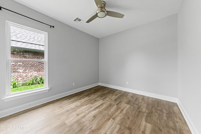 147 Gable Crest Dr, Lafayette, LA 70507 - spare room featuring wood finished floors, healthy amount of natural light, and ceiling fan