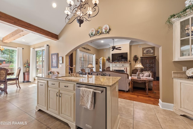 104 Baltimore Ln, Lafayette, LA 70506 - kitchen featuring dishwasher, light tile patterned flooring, a ceiling fan, a chandelier, and light stone countertops