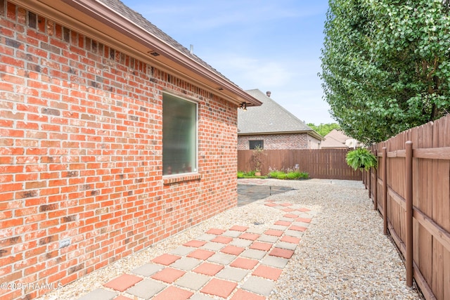 104 Baltimore Ln, Lafayette, LA 70506 - fenced backyard featuring a patio area