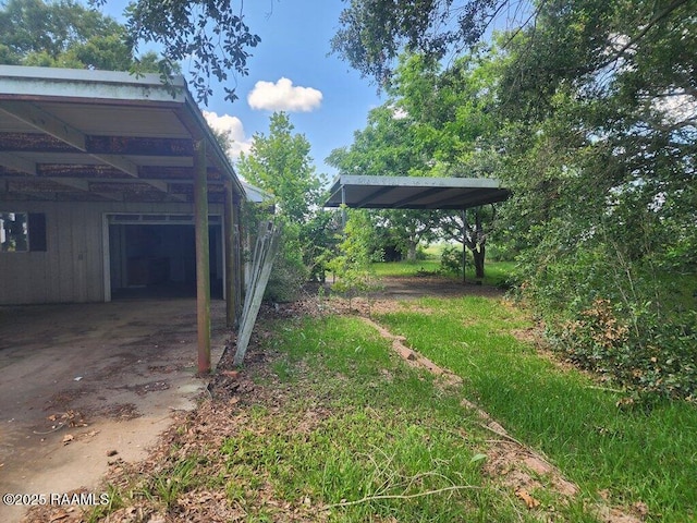 37208 Monceaux Rd, Gueydan, LA 70542 - view of yard with a carport