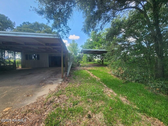 37208 Monceaux Rd, Gueydan, LA 70542 - view of yard with a carport