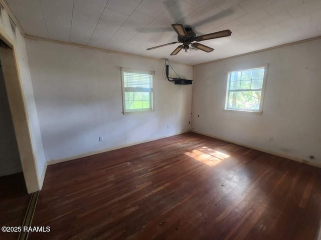 37208 Monceaux Rd, Gueydan, LA 70542 - unfurnished room featuring healthy amount of natural light, wood finished floors, a ceiling fan, and ornamental molding