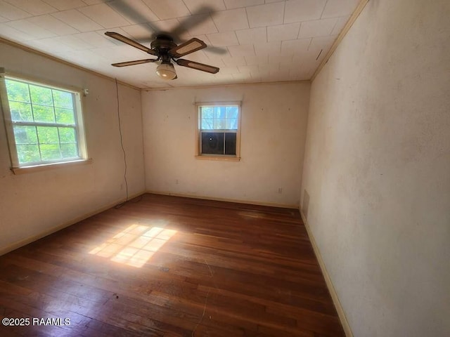 37208 Monceaux Rd, Gueydan, LA 70542 - spare room with hardwood / wood-style floors, ceiling fan, baseboards, and crown molding