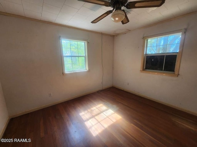 37208 Monceaux Rd, Gueydan, LA 70542 - spare room with crown molding, wood finished floors, baseboards, and ceiling fan