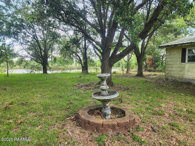 37208 Monceaux Rd, Gueydan, LA 70542 - view of green lawn featuring a water view