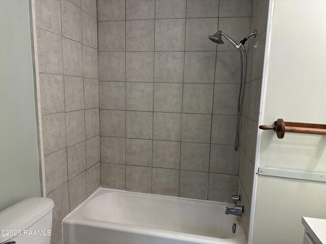 1002 Vidrine St, Opelousas, LA 70570 - bathroom featuring toilet, washtub / shower combination, and vanity