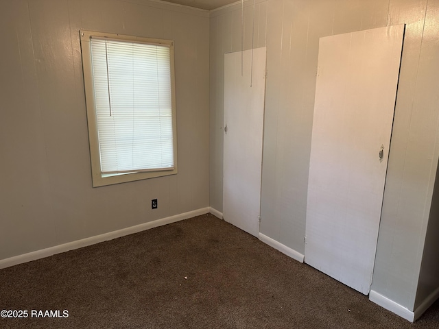 1002 Vidrine St, Opelousas, LA 70570 - unfurnished bedroom featuring carpet flooring and baseboards