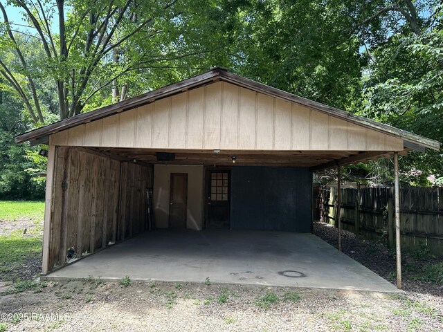 1002 Vidrine St, Opelousas, LA 70570 - garage featuring a carport