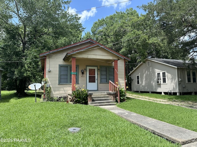 1002 Vidrine St, Opelousas, LA 70570 - view of front of property featuring a front lawn