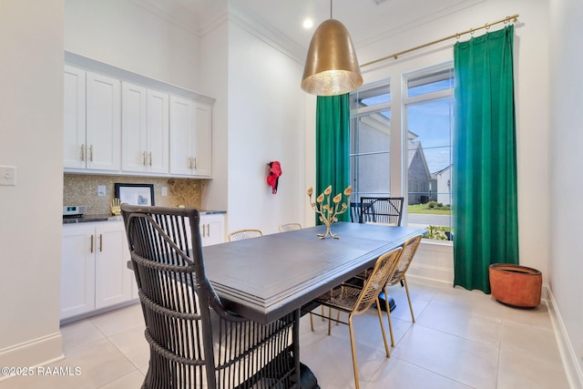 307 Harvest Creek Ln, Lafayette, LA 70508 - dining room with light tile patterned floors and crown molding