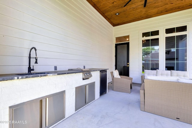 307 Harvest Creek Ln, Lafayette, LA 70508 - view of patio / terrace with exterior kitchen, an outdoor hangout area, and a ceiling fan