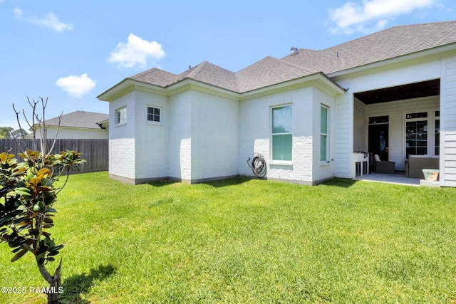 307 Harvest Creek Ln, Lafayette, LA 70508 - back of house featuring roof with shingles