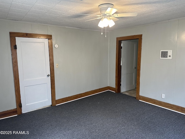 627 S Railroad Ave, Opelousas, LA 70570 - unfurnished room featuring carpet flooring, ceiling fan, and baseboards