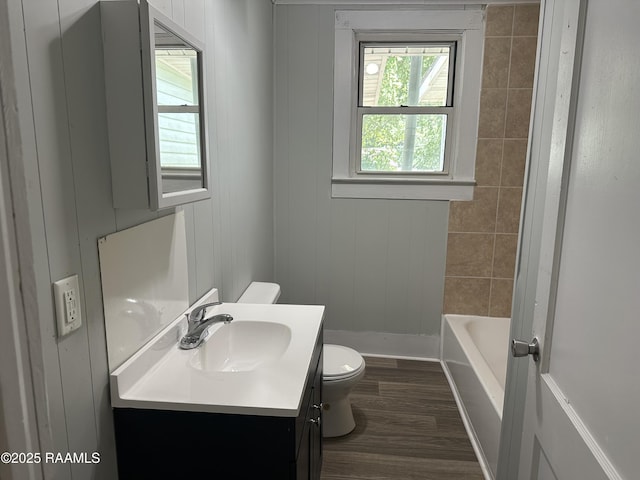 627 S Railroad Ave, Opelousas, LA 70570 - bathroom with toilet, vanity, and wood finished floors