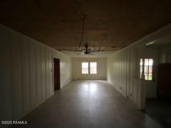 109 Pecan St, Ville Platte, LA 70586 - spare room featuring ceiling fan and concrete floors