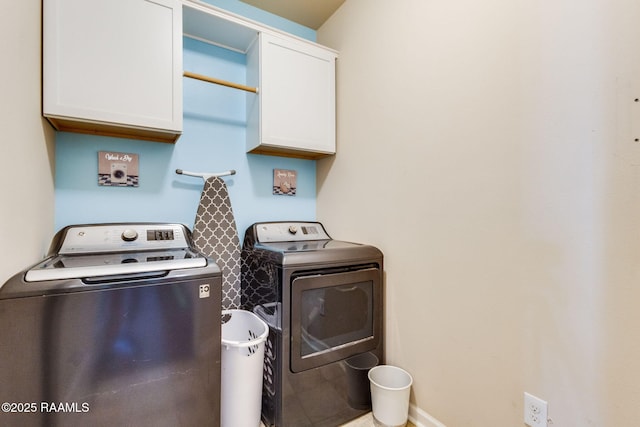 206 Agrarian Ave, Rayne, LA 70578 - laundry room featuring cabinet space and washer and dryer