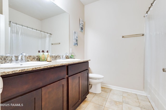 206 Agrarian Ave, Rayne, LA 70578 - full bath with double vanity, a shower with curtain, and tile patterned flooring