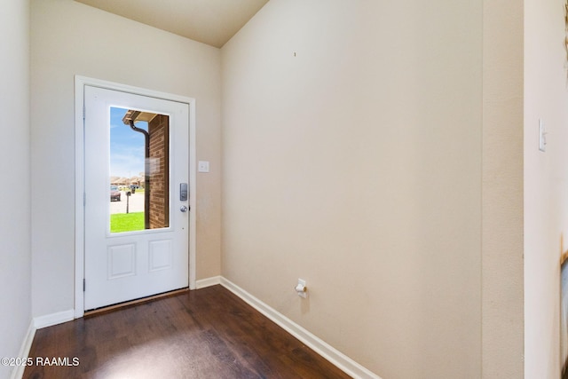 206 Agrarian Ave, Rayne, LA 70578 - doorway to outside with dark wood-style floors and baseboards