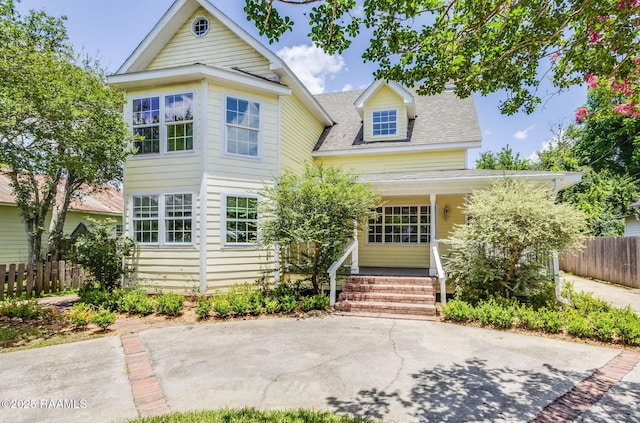 315 Tissington St, Lafayette, LA 70501 - traditional-style home featuring covered porch and roof with shingles