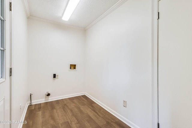 315 Tissington St, Lafayette, LA 70501 - laundry room featuring hookup for a washing machine, dark wood-style floors, ornamental molding, a textured ceiling, and hookup for a gas dryer