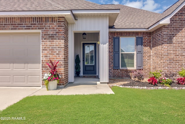 209 Crescent View Ln, Duson, LA 70529 - property entrance with roof with shingles, brick siding, a garage, a yard, and concrete driveway