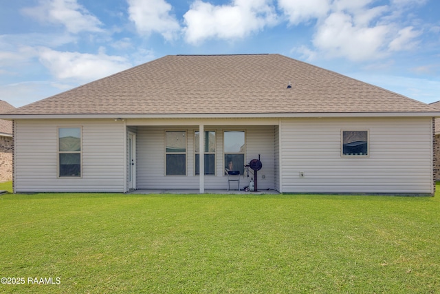 209 Crescent View Ln, Duson, LA 70529 - back of property featuring a yard and roof with shingles
