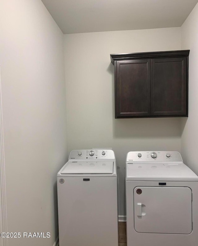 209 Crescent View Ln, Duson, LA 70529 - laundry room featuring cabinet space and washing machine and clothes dryer