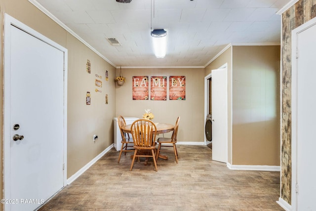 1521 Saint Jude Ave, New Iberia, LA 70560 - dining room featuring ornamental molding and wood finished floors