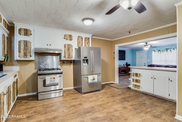 1521 Saint Jude Ave, New Iberia, LA 70560 - kitchen featuring appliances with stainless steel finishes, a ceiling fan, under cabinet range hood, white cabinets, and ornamental molding