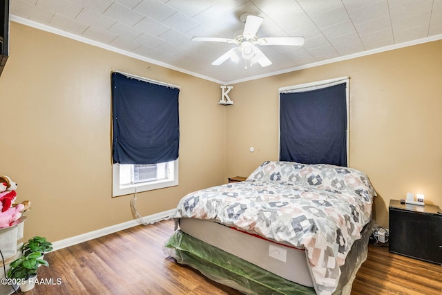 1521 Saint Jude Ave, New Iberia, LA 70560 - bedroom with ornamental molding, wood finished floors, a ceiling fan, and cooling unit