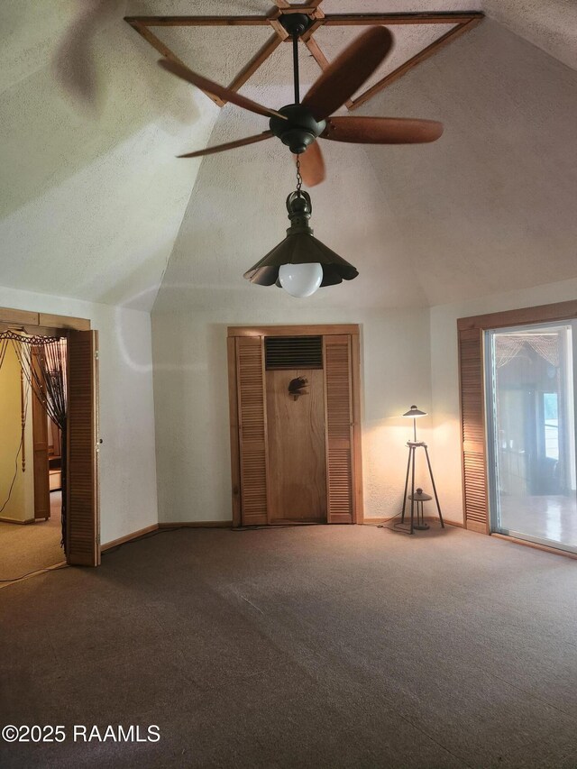 101 Hidden Hills Lake Rd, Arnaudville, LA 70512 - unfurnished living room featuring carpet flooring, vaulted ceiling, a ceiling fan, and a textured ceiling