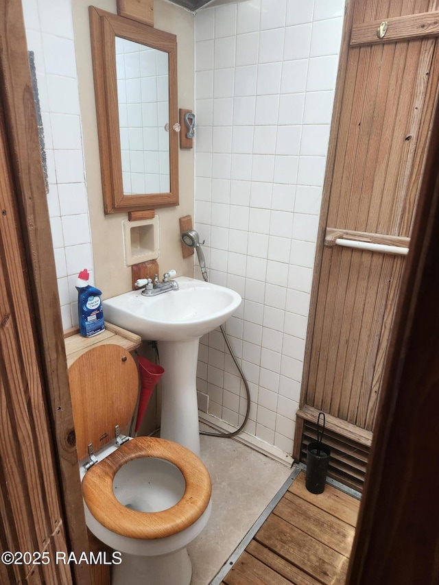 101 Hidden Hills Lake Rd, Arnaudville, LA 70512 - bathroom with toilet and wood finished floors