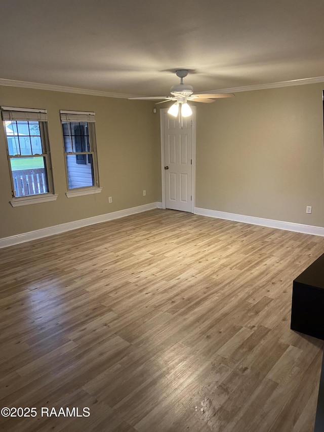 232 Mills St, Scott, LA 70583 - empty room featuring crown molding, wood finished floors, and ceiling fan