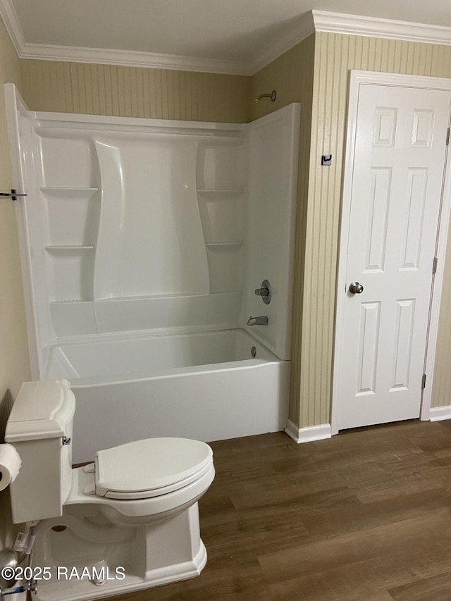 232 Mills St, Scott, LA 70583 - bathroom featuring wood finished floors, tub / shower combination, and crown molding