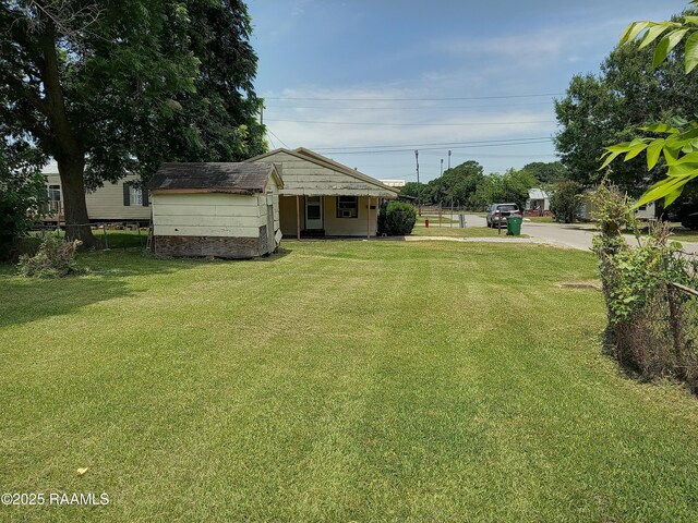 1502 Cherokee St, Abbeville, LA 70510 - view of yard featuring driveway