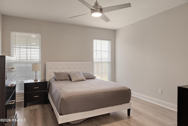 310 Harvest Ln, Abbeville, LA 70510 - bedroom featuring light wood-style flooring and a ceiling fan