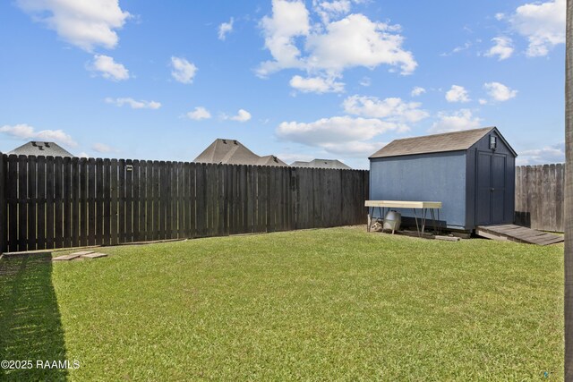 310 Harvest Ln, Abbeville, LA 70510 - fenced backyard with a storage shed