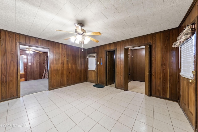 1530 S Fieldspan Rd, Duson, LA 70529 - empty room with ceiling fan and wood walls