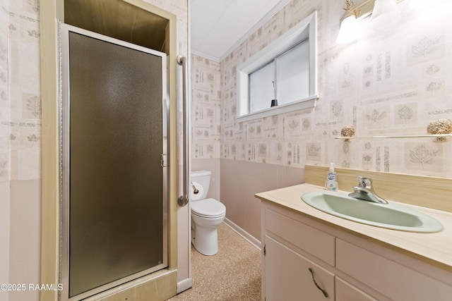 1530 S Fieldspan Rd, Duson, LA 70529 - bathroom with wallpapered walls, vanity, a shower stall, and wainscoting