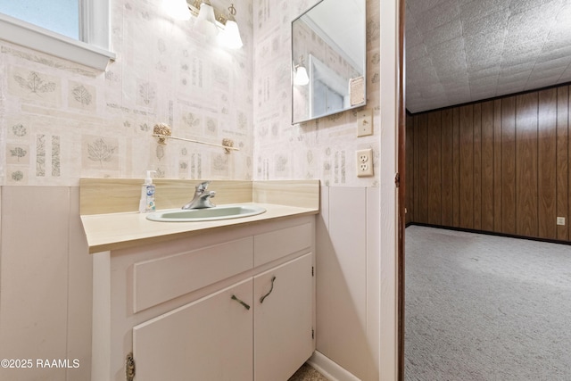 1530 S Fieldspan Rd, Duson, LA 70529 - bathroom with vanity, wallpapered walls, and wooden walls