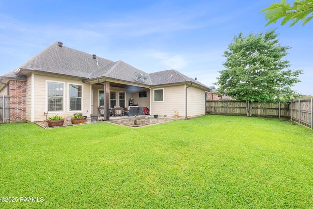 105 Cane Creek Dr, Broussard, LA 70518 - rear view of house featuring a fenced backyard, a patio area, and roof with shingles