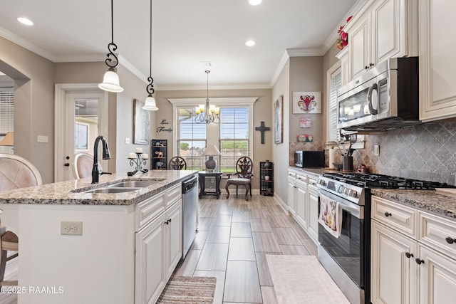 105 Cane Creek Dr, Broussard, LA 70518 - kitchen with appliances with stainless steel finishes, tasteful backsplash, recessed lighting, a chandelier, and a kitchen island with sink