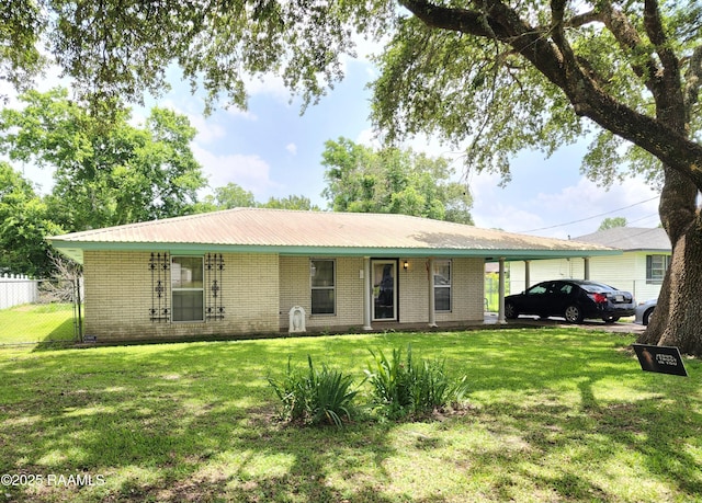 2115 Vige St, Opelousas, LA 70570 - ranch-style home featuring brick siding, a garage, and metal roof